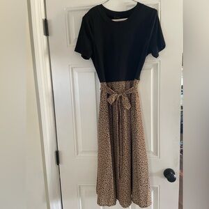 A-line midi with pockets! 🐆🖤👗